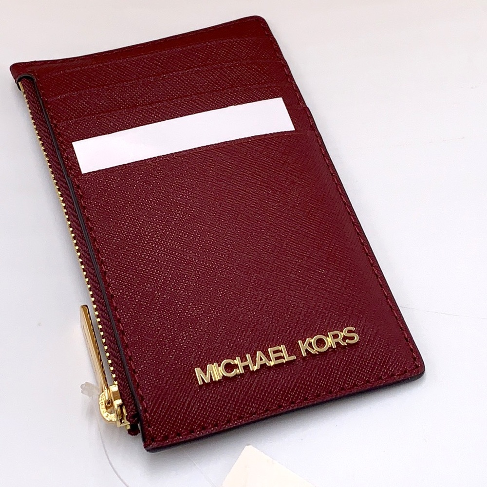 Michael Kors Jet Set Travel Medium Top Zip Card
Case Wallet
Dark Sherry color - Picture 2 of 11